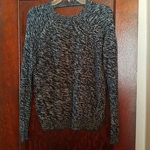 Light sweater with back cut out and side slits